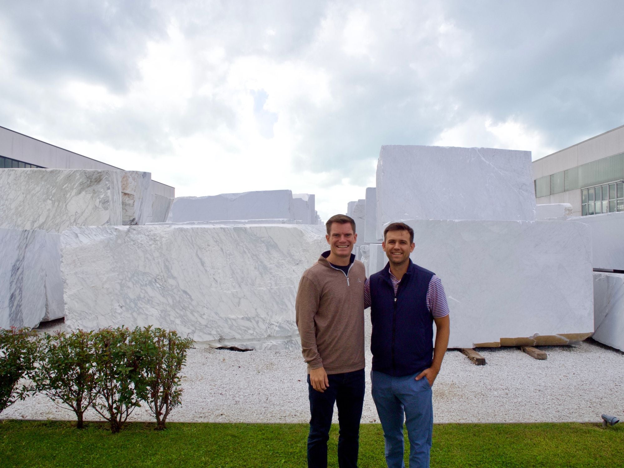Cabe and Matt among marble blocks in Italy